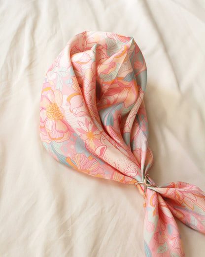 Bunny in the Floral Breeze Silk Twill Scarf with colorful floral design, perfect for hair or bag decoration.