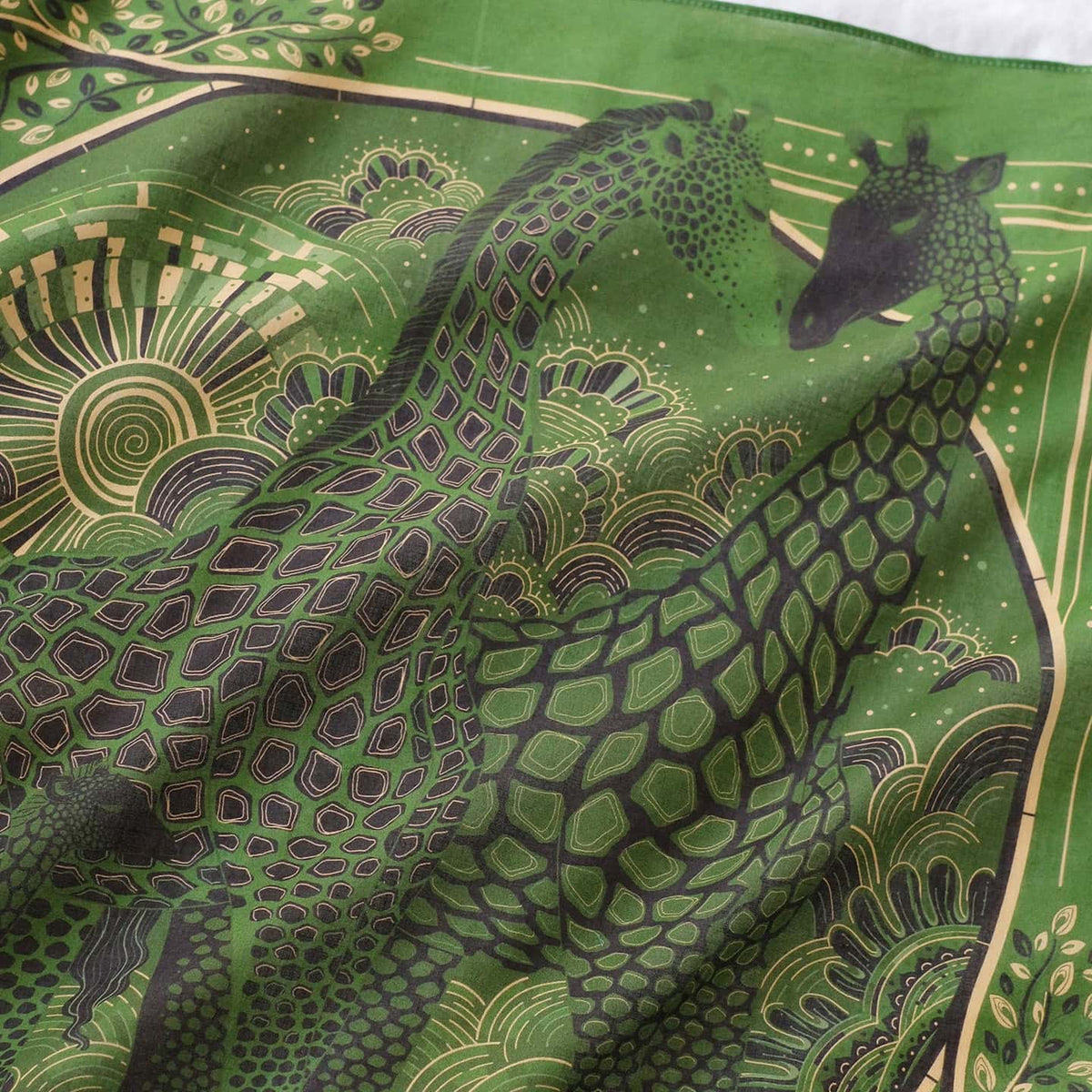 Olive green bandana scarf featuring a Giraffe family design with Savanna grassland art.