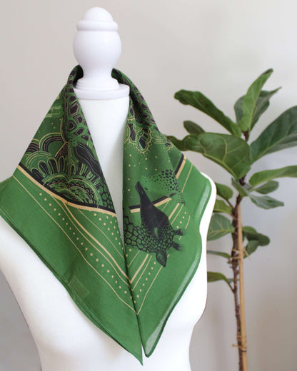 Olive green bandana scarf featuring a Giraffe family in a Savanna art design, perfect for hair or bag decoration.