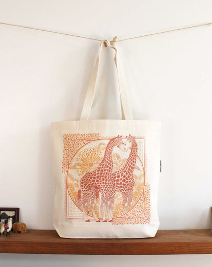 Giraffe art tote bag featuring two giraffes in a beautiful design on organic cotton canvas.