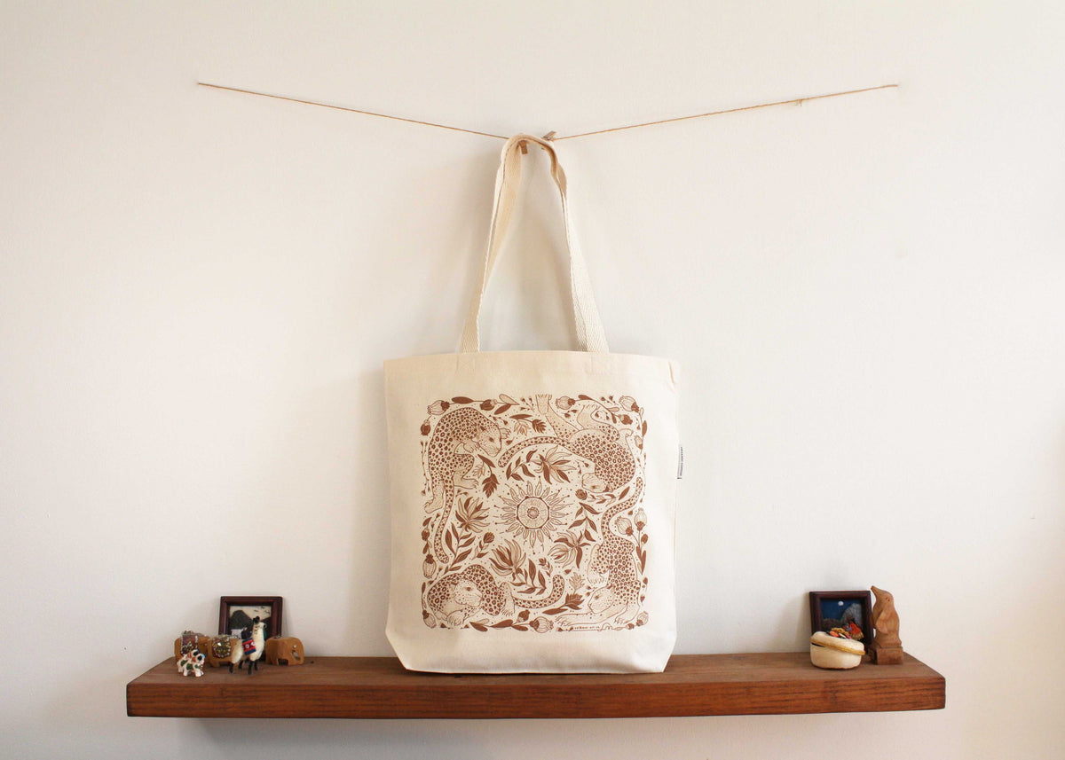 Leopard and the Sun canvas tote bag with intricate line art, ideal for shopping and summer outings.