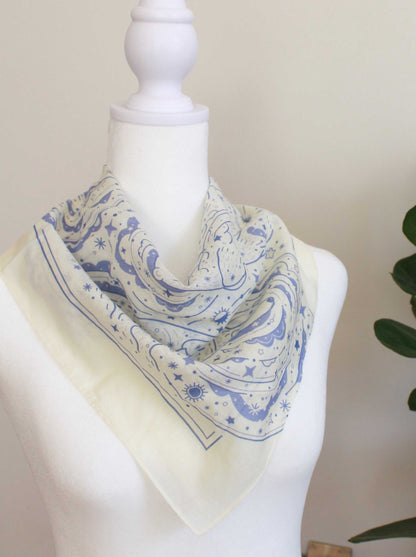 Off-white bandana scarf featuring Polar Bear and Northern Sky art, perfect for hair, bags, or pets.