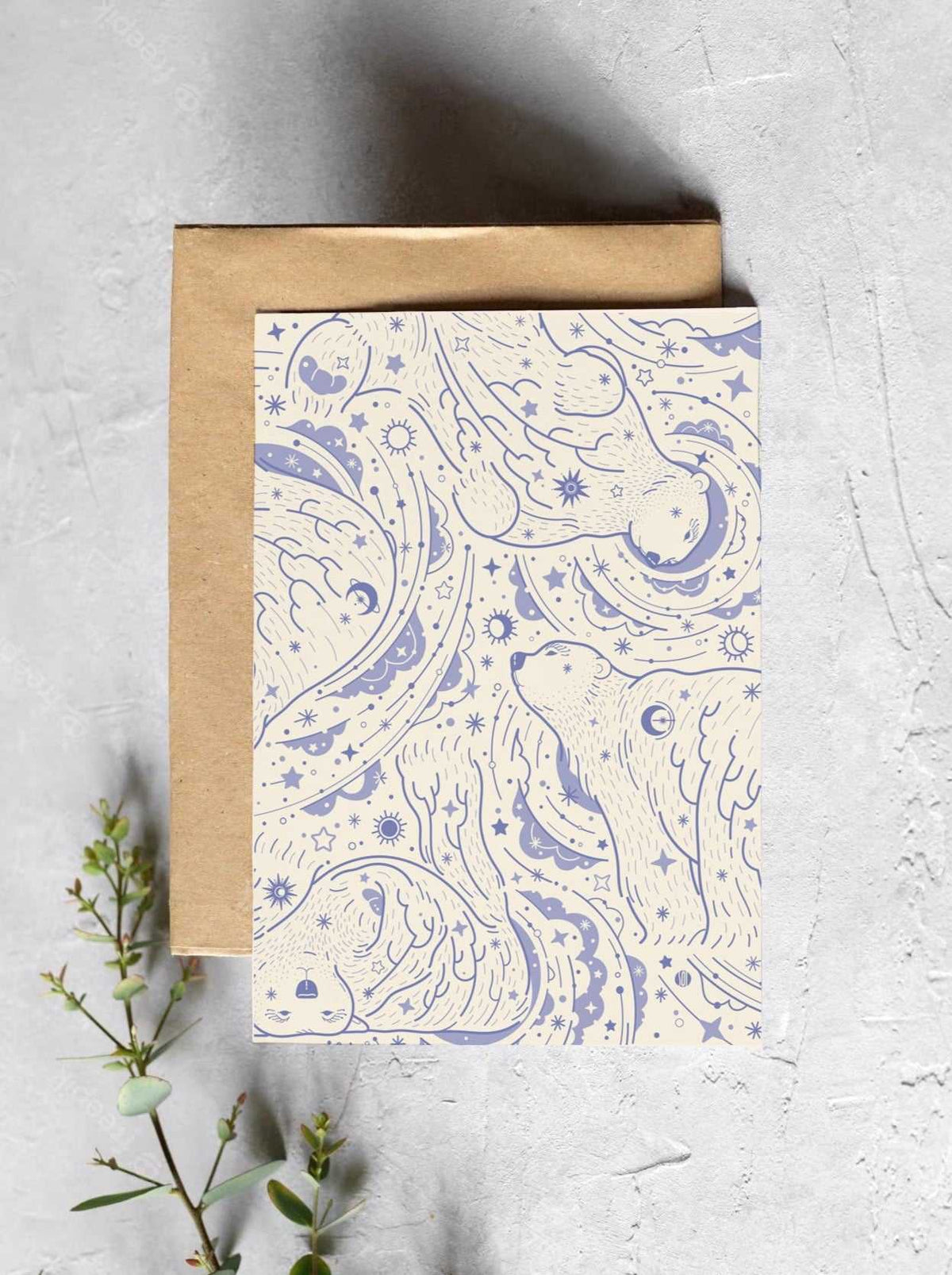 Off-white bandana scarf featuring polar bear and celestial design, presented with a brown envelope.