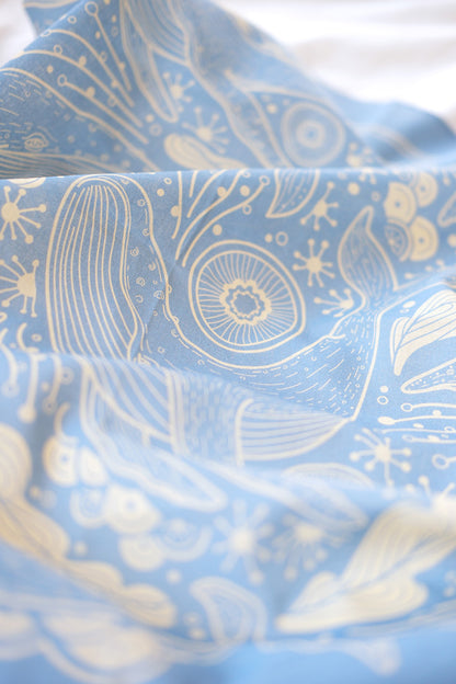 Light blue bandana scarf featuring Humpback whale and ocean art design, perfect for hair, pets, or bags.