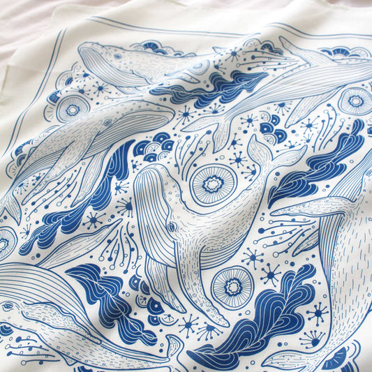 Whale and the Ocean bandana scarf in off-white featuring Humpback whale art design in blue, perfect for accessories and décor.