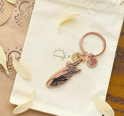 Whale Shark enamel keychain with habitat design and round tag, on eco-friendly display card.